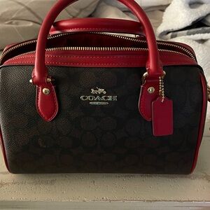 Coach Boston bag with detachable Crossbody strap.